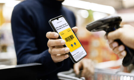 Asian Man Contactless Payment With Qr Code In Supermarket